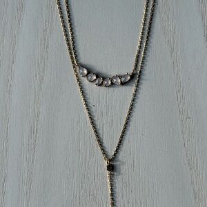 Elegant Silver Necklace with Gold Accents